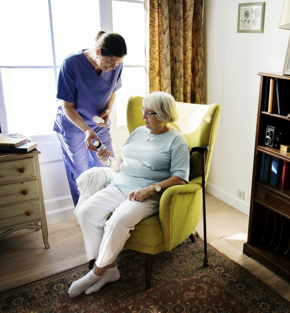 Nurse taking care of a senior woman